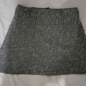 Women's short skirt with belt loops.